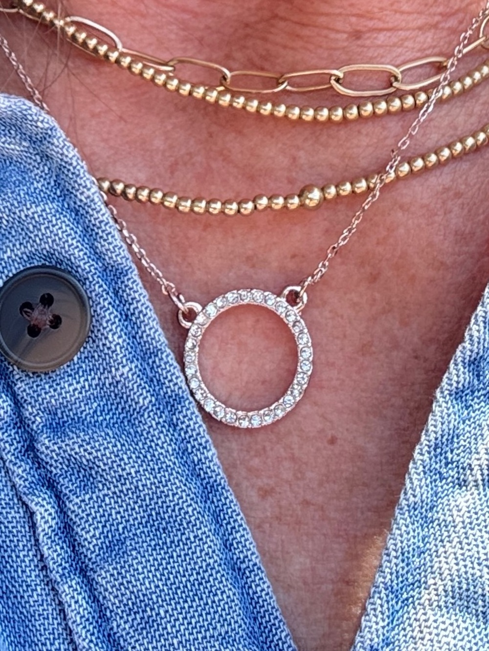 Dainty Pavé Circle Pendant Necklace in rose gold with rhinestones.